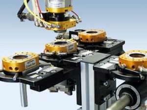 Robotic machine tending solutions, quick-change tooling. 