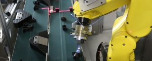 High speed robotic picking of randomly fed parts using 3D machine vision
